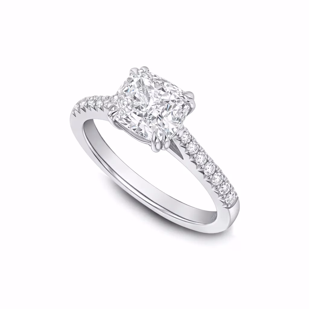 Cushion Cut Solitaire Diamond Ring with a Diamond Set Band in Platinum